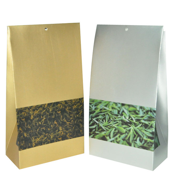 Η κίτρινη αργυροειδής μεταλλίνη τελειώνει την πλαστική συσκευάζοντας τσάντα με τετραγωνικό Bpttom για το τσάι