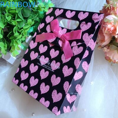 Εξατομικευμένες προσαρμοσμένες τσάντες εγγράφου με τη λαβή για τα Χριστούγεννα