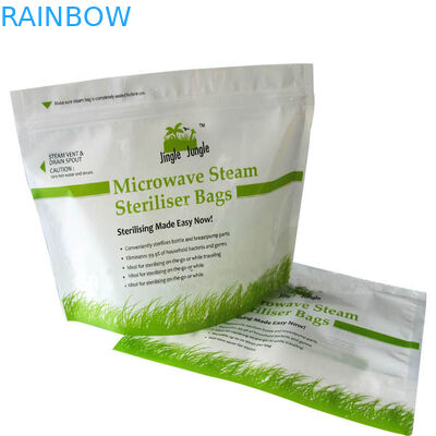 Πράσινες τοποθετημένες σε στρώματα μικροκυμάτων τσάντες σφραγίδων τροφίμων κενές που τυπώνουν με το φερμουάρ