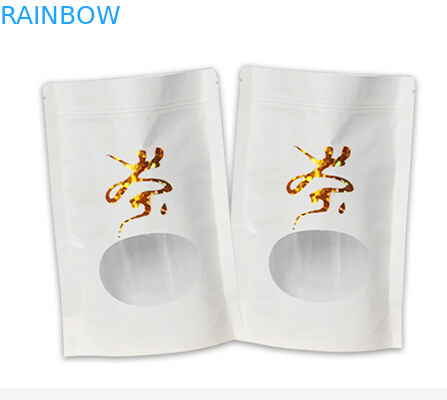 Άσπρη στάση εγγράφου του Κραφτ επίπεδων κατώτατων σημείων επάνω στην τσάντα με ziplock φερμουάρ mylar και το παράθυρο