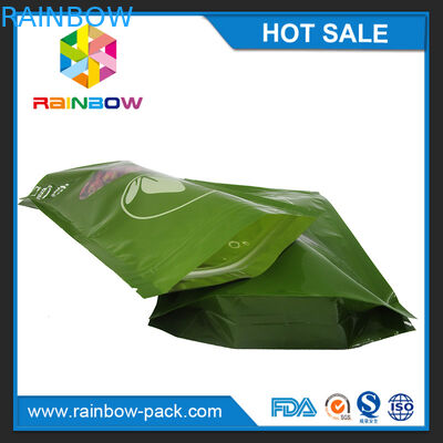 Οι πράσινες τσάντες τσαγιού που συσκευάζουν τυπωμένο Mylar στέκονται επάνω Ziplock την τσάντα με το σαφές παράθυρο