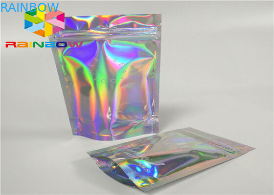 Η σακούλα φύλλων αλουμινίου Mylar λέιζερ με τη σαφή πλευρά για τη στιλβωτική ουσία καρφιών ακτινοβολεί σκονών συσκευάζοντας τσάντες φύλλων αλουμινίου ολογραμμάτων συσκευασίας καλλυντικές