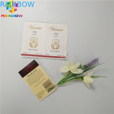 Τα συγκολλητικά μπουκάλια ουσιαστικού πετρελαίου συρρικνώνονται τις αυτοκόλλητες ετικέττες ετικετών περικαλυμμάτων που τυπώνουν για τα ενδύματα τσαντών κιβωτίων