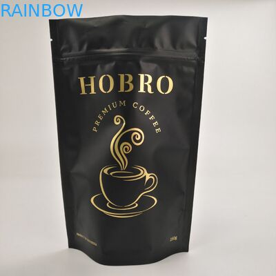 Στάσεων επάνω ματ μαύρες τοποθετημένες σε στρώματα αργιλίου φύλλων αλουμινίου φερμουάρ κλειδαριών συσκευάζοντας τσάντες φασολιών καφέ τσαντών καφέ συσκευάζοντας με τη βαλβίδα