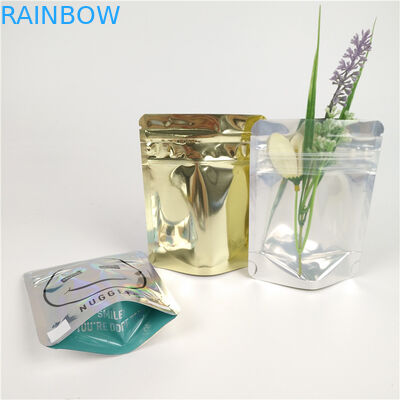 Χρωματισμένη στάση τσαντών συσκευασίας τροφίμων επάνω στις τοποθετημένες σε στρώματα τσάντες κλειδαριών φερμουάρ Mylar φύλλων αλουμινίου αργιλίου βαθμού τροφίμων