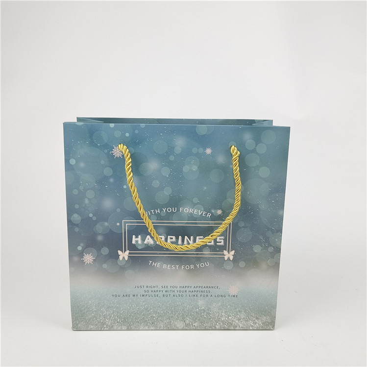 Καλύτερα πωλούμενο Ανακυκλώσιμο Περιβαλλοντικά φιλικό λογότυπο Εκτυπωμένη χαρτοσακούλα για ψώνια Συσκευή Λευκή 110 γραμμάρια Επαναχρησιμοποιήσιμη