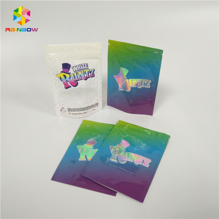 Τσάντα πρόχειρων φαγητών λέιζερ ολογραμμάτων που συσκευάζει την ακίνδυνη για τα παιδιά σακούλα παραθύρων κλειδαριών φερμουάρ για τα καλλυντικά