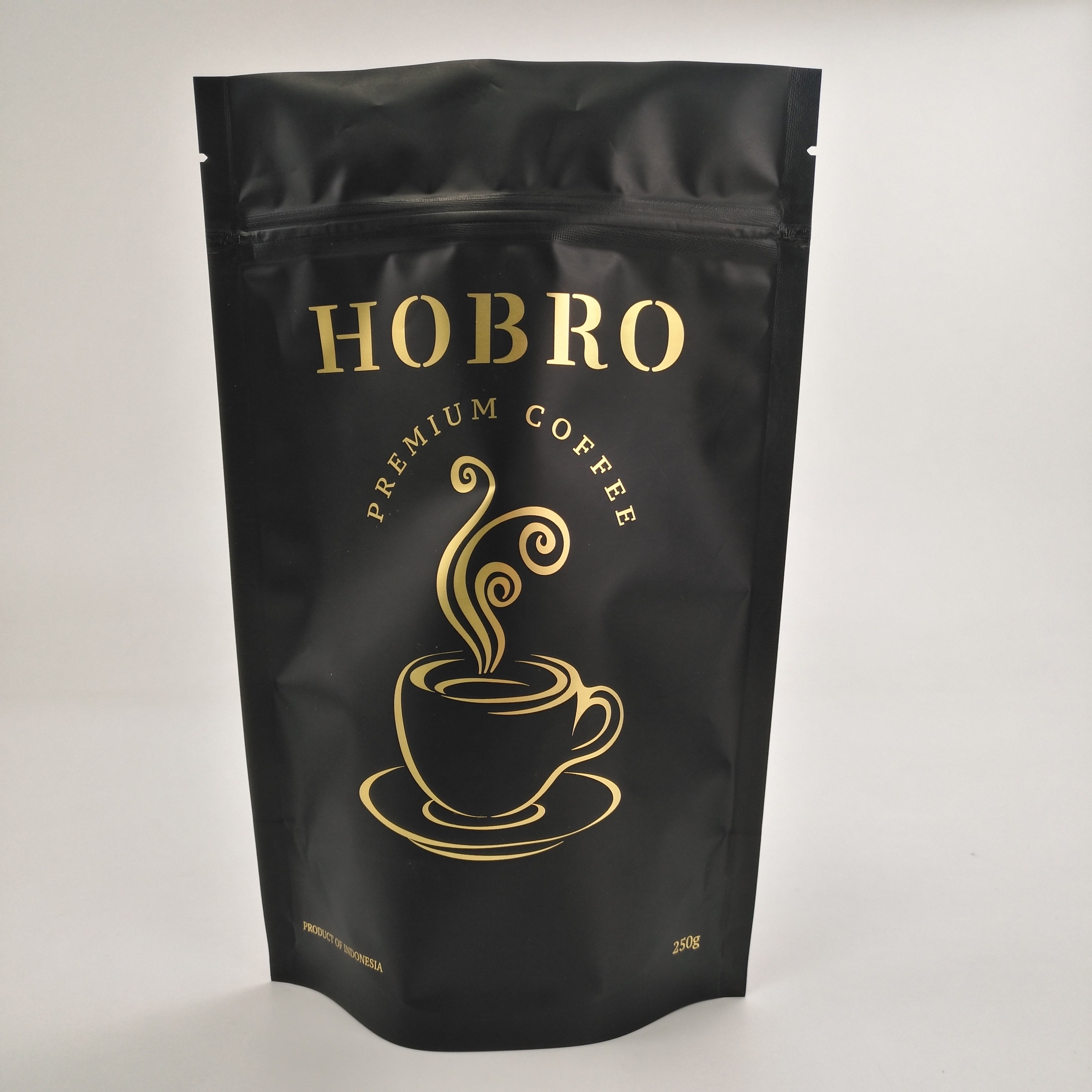 Στάσεων επάνω ματ μαύρες τοποθετημένες σε στρώματα αργιλίου φύλλων αλουμινίου φερμουάρ κλειδαριών συσκευάζοντας τσάντες φασολιών καφέ τσαντών καφέ συσκευάζοντας με τη βαλβίδα