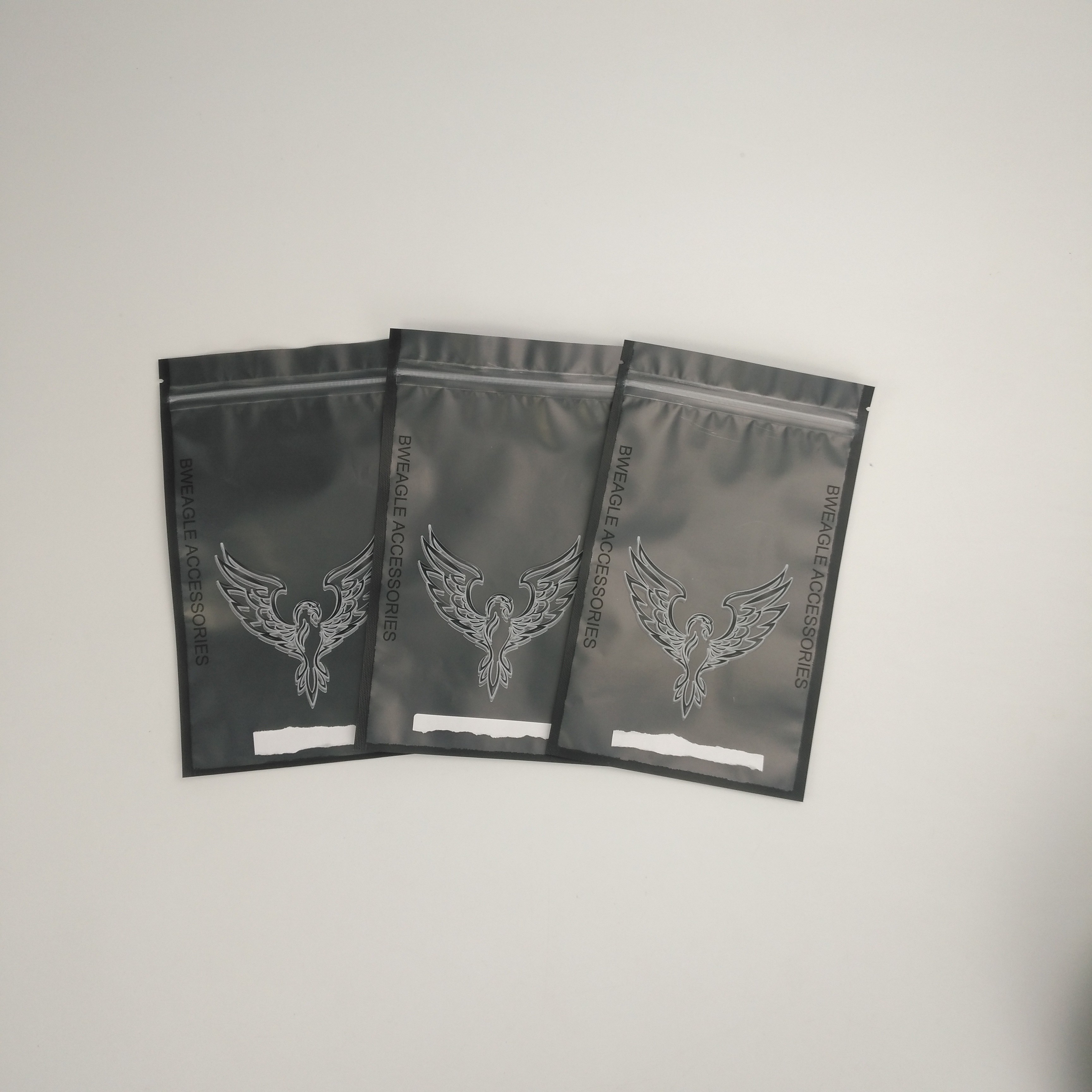 Προσαρμοσμένα στιλπνά εξαρτήματα ακουστικών που συσκευάζουν τις κάσκες ακουστικών ακουστικών τσαντών που συσκευάζουν τις τσάντες με το λογότυπο συνήθειας