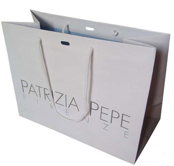 Μεγάλες άσπρες τσάντες εγγράφου της Kraft προσαρμοσμένες έγγραφο με την τρύπα στο κέντρο